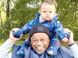 Mike Umaga with grandson on his sholders
