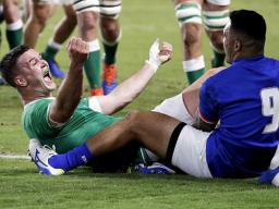 Ireland's Johnny Sexton celebrates after scoring a try against Samoa