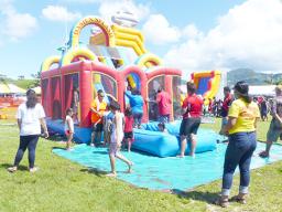 Kids enjoying jumpers at Farm Fair