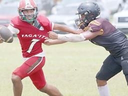  Vikings quarterback trying to escape Warrior defense