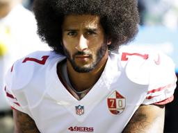 Colin Kaepernick kneels