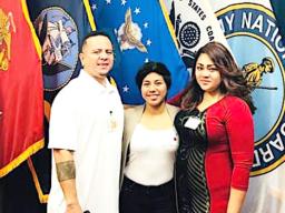 Kailelei Sesepasara with her parents, Hank and Precious
