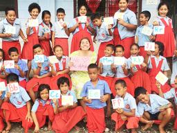 A U.S. Peace Corps volunteer in Samoa with her elementary students