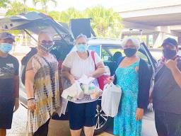 People providing food for veterans