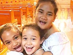 3 laughing and joyful young girls