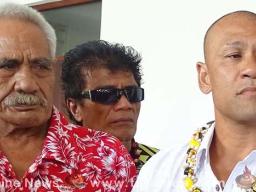 Paulo Malele or King Faipopo (in white shirt) who is charged for making false statements against the Prime Minister, with some of his supporters outside court