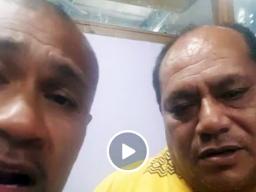 King Faipopo and a relative during a live broadcaast last night 
