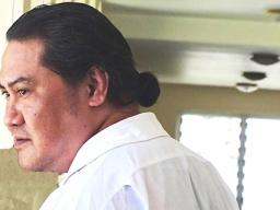 Kolani Junior Lam outside the courthouse in Samoa.