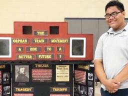 Koneferinisi Purcell of Manumalo Academy with his project "The Orphan Train Movement: A Ride to a Better Future?" 