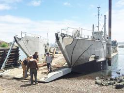 A landing craft being used for commercial purposes