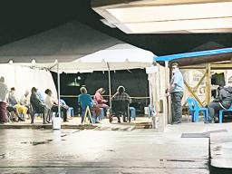 LBJ COVID testing tent with patients waiting inside