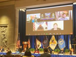 Governor Lemanu and Congresswoman Uifa’atali on the screen at IGIA meeting