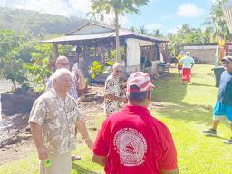 Leone chiefs inspecting homes in the village