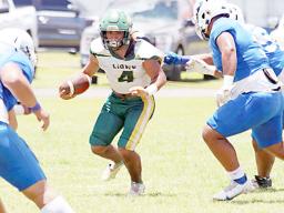 Leone Lions Wylan Faga looking for an open lane