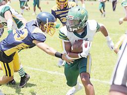 Ilalio Sefika trying to shake off a Marist defender