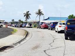 Vehicles lined up at Drive thru vax site