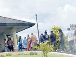 People in line at ATM