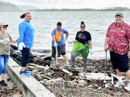 Homeland Security staffers at Lions Park clean up
