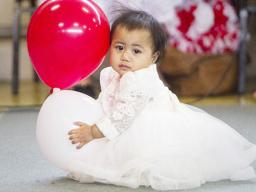Little girl in her White Sunday finery