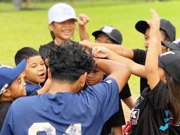 Little League TeeBall players with coach Paul Cassens-Hunkin