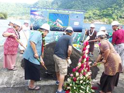 Gov. Lolo Matalasi Moliga (far right), accompanied by Western Pacific Regional Fishery Management Council chairman Taotasi Archie Soliai and others