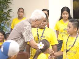  Lt. Gov Pulumataala Ae Ae Jr. in his role as Acting Governor with students