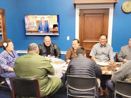 Governor's traveling group at lunch with Amata