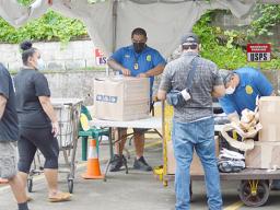 Customs agent inspecting a packages