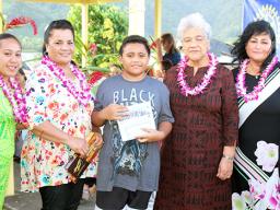 Eleven-year-old Malakai Seva’aetasi with his grandmother, the First Lady and  One Global Family co-founder and her daughter