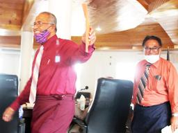 ASG Treasurer Malemo L. Tausaga (front) and LBJ Medical Center chief executive officer Faumuina John Faumuina