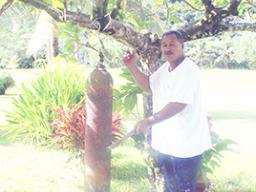 A Pago Pago villager ringing the curfew bell