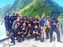 DPS officers posing in Ofu, Manu'a after drug raid in June 2020