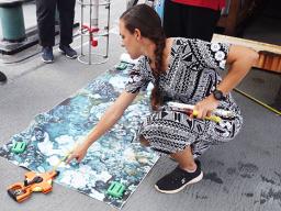 Crew member showing ocean floor mapping