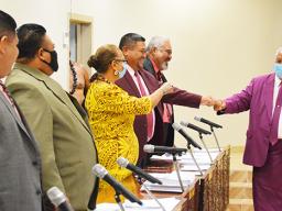 Faipule with and without face masks