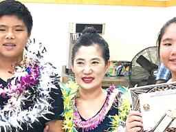 The Lo siblings — Michelle and Kevin — with local math instructor/ tutor Mrs. Seongshim Park 