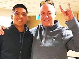 Samoana High School's Darius McMoore with Colorado State University, Pueblo head football coach John Wristen