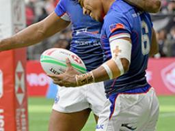 Tila Mealoi is hugged by David Afamasaga 