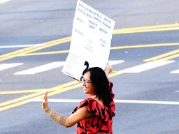 Moira Maiava protesting for better healthcare for American Samoa