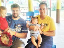 Ms Lautoo, husband and children
