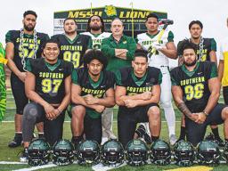 Pictured are some of the sons of Samoa who are currently on the roster, with MSSU running back coach, Keiki Misipeka (far right); academic support specialist, Rachel Jennings (far left) - both natives of American Samoa - and head coach Jeff Sims (middle row, center). 