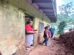 mudslide shoveled away from house