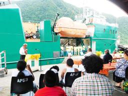 Manuatele crew looking out from the vessel during Sunday's welcome ceremony