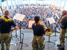 NAVY BAND MEMBERS PERFORMING FOR STUDENTS IN SAMOA