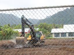 Backhoe working at the site