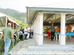 Electors stand in line outside while others were inside the Nu’uuli polling station