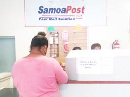  Applicant posting application form at the Samoa Post