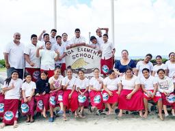 ASDHS personnel and students and staff at Olosega Elementary school