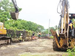Workmen in Ottoville laying pipelines