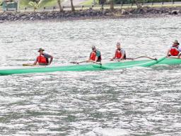Paddlers in an outrigger canoe