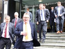 Adrian Orr and others on steps of Reserve Bank of New Zealand